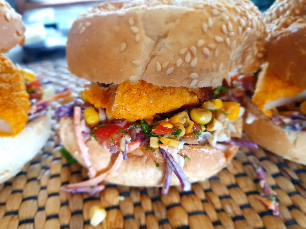 Succulent Crumbed Prawn Burger with Refreshing Corn and Tomato Salsa and Crunchy Coleslaw